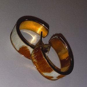 Gold cow hide hoop earrings